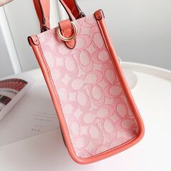[コーチ] 縦版 コーラル レッド dempsey トートバッグ field tote 22 ショッピングバッグ 帆布 手提げメッセンジャーバッグの画像