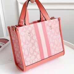 [コーチ] 縦版 コーラル レッド dempsey トートバッグ field tote 22 ショッピングバッグ 帆布 手提げメッセンジャーバッグの画像