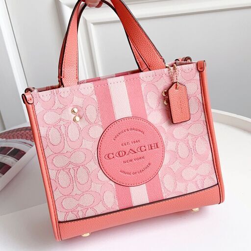 [コーチ] 縦版 コーラル レッド dempsey トートバッグ field tote 22 ショッピングバッグ 帆布 手提げメッセンジャーバッグ
