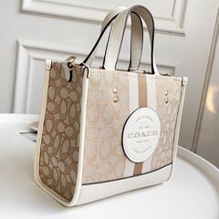 [コーチ] 縦版 レッドブラウン トートバッグ field tote 22 dempsey ショッピングバッグ 帆布 手提げメッセンジャーバッグの画像