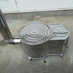 煮炊きの出来るストーブの画像