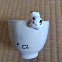 コップ　ネコの画像