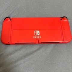 ニンテンドースイッチ有機EL　Switch  マリオレッドの画像