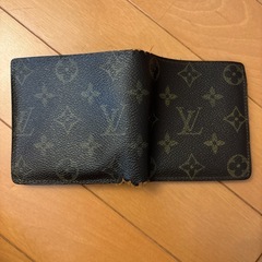 ルイヴィトン　財布　内側状態悪い、外側状態少し悪い　使用年数約8年の画像