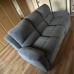 定価15万電動リクライニングソファーの画像