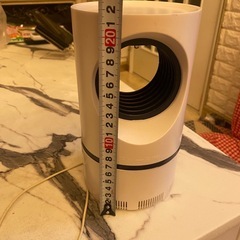 蚊をつかむ機械の画像