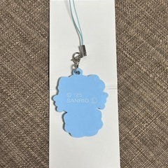 日焼けキティちゃん クリアバックとチャーム水色の画像