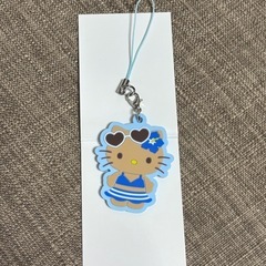 日焼けキティちゃん クリアバックとチャーム水色の画像