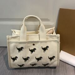 [コーチ] トートバッグ 恐竜 モチーフ ショルダーバッグ dinosaurs ディズニー ミッキー 限定コラボ logo 刺繡 ハンドバッグの画像
