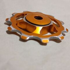 ベアリングプーリー アルミ製　ジャンク　11T ゴールドの画像
