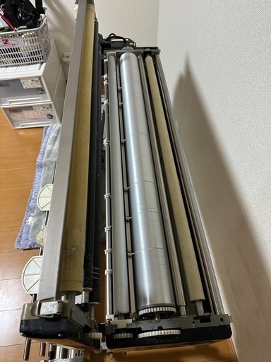 クロス糊付け機
