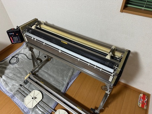 クロス糊付け機
