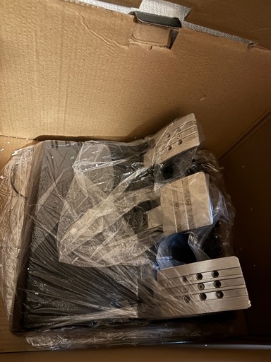 Thrustmaster GT Racing Wheelとレーシングシートのセット。 