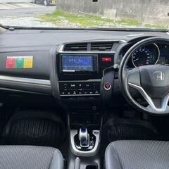 H25 フィットハイブリッド Lパッケージ エアコンOK フルセグ ETC Bluetooth バックカメラ禁煙車　の画像
