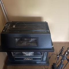 石油ストーブ 暖房器具 昭和レトロ 引取歓迎　薪ストーブ風の画像