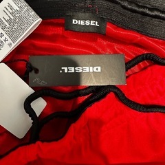 新品未使用 タグ付き DIESEL 赤のスポーツ用ショートパンツ XLの画像