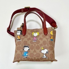 コーチ PEANUTS スヌーピー ショルダーバッグ レディース 斜め掛けの画像
