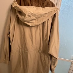 The North Face 黄色コート の画像