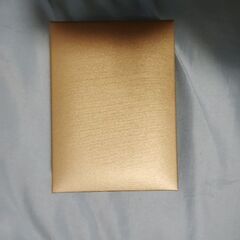 モンチッチ　50周年記念ペンダントの画像