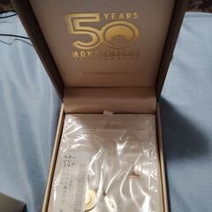 モンチッチ　50周年記念ペンダントの画像