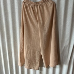 丈91㎝くらいのパンツスカート　ポリエステル100% 薄いオレンジ色の画像