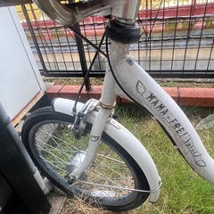 後ろに子供乗せ自転車の画像