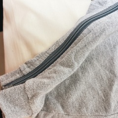 NIKE フード付きグレーロンパースの画像