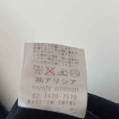 藍色の洋服の画像