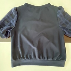 藍色の洋服の画像
