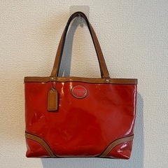 大人気シリーズのCOACHハンドバッグとTOMMY HILFIGERの長財布の2つセットでご提供です☺︎︎の画像