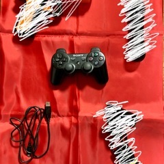 PS3本体とコントローラー
の画像