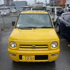 ダイハツ ネイキッドイエロー 検9年5月の画像
