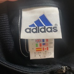 adidasメンズジャージセットアップの画像