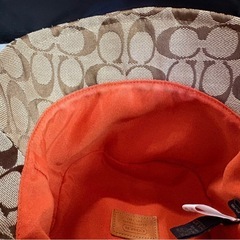 COACH シグネチャー バケットハット ベージュ 裏オレンジ 帽子 コーチ 中古品 ①の画像