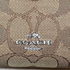 COACH 二つ折り財布　シグネチャー　ベージュ×レッドの画像