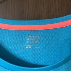 ニューバランス レディース スポーツウェア Tシャツの画像