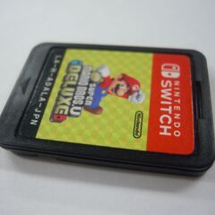 (M-785) New スーパーマリオブラザーズUデラックス ゲーム ソフトのみ 起動確認済み SUPER MARIOBROS,U DELUXE  Nintendo Switch 任天堂 スイッチ ケースなし 中古　の画像