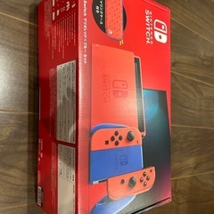 Nintendo Switchと予備コントローラの画像