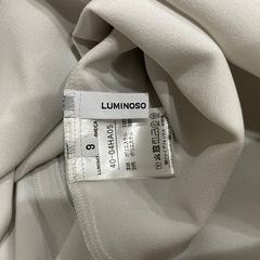 タートルネックブラウス LUMINOSO COMMECAの画像