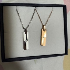 white clover ペアネックレスの画像