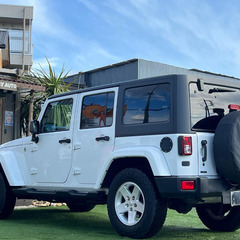ローンは毎月19,500円～　ジープ　ラングラーアンリミテッド スポーツ　切り替え式４ＷＤ　カロッツェリアナビゲーション　Ｂｌｕｅｔｏｏｔｈ　地デジＴＶ　バックカメラ　キーレス　クルーズコントロール　ルーフオープン可能　ボディ同色フェンダーの画像