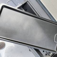 バーベキューコンロと木炭のセットの画像