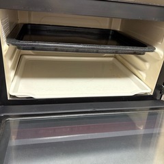 中古の赤い日立電子レンジの画像
