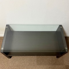 ブラウン ガラステーブルの画像