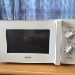 LP専用ガスコンロと電子レンジの画像