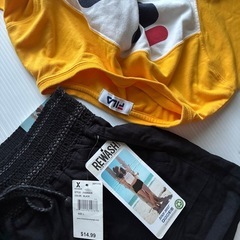 FILAのクロップドTシャツ　ブラックショートパンツ　セットの画像