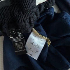 FILAのクロップドTシャツ　ブラックショートパンツ　セットの画像