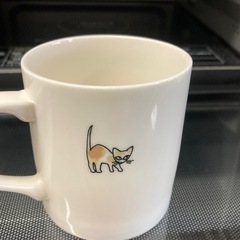 猫とネズミのマグカップの画像