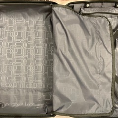 スーツケース「AMERICAN TOURISTER」 (白•黒)の画像