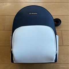 & chouetteネイビーホワイト ラウンドリュックの画像
